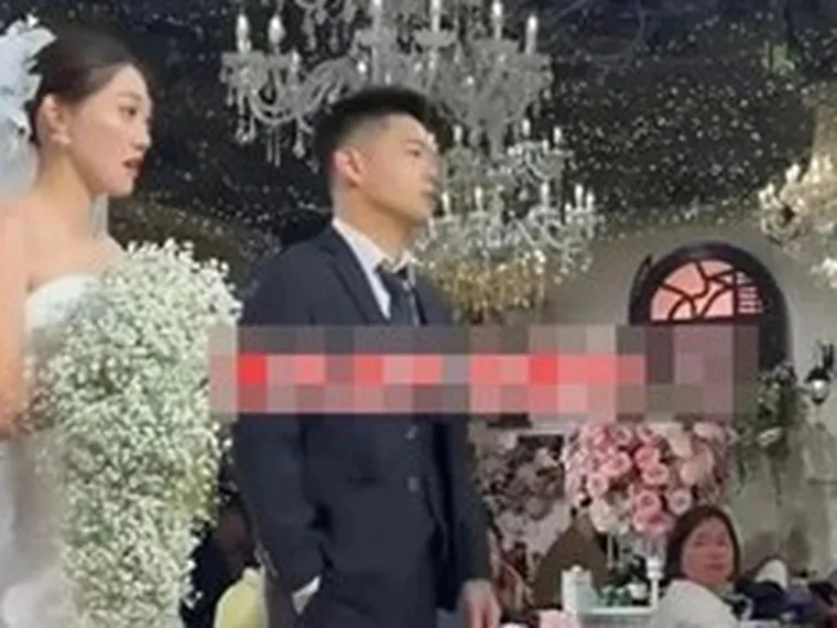 Giữa đám cưới, chú rể có hành động "lạ" khiến cô dâu khó xử